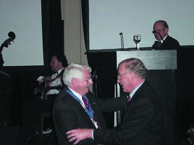 John Yeo receiving the International Spinal Cord Societys medal, 2000, being presented by the President of the Society Professor Hans Frankel, Copyright held by image owner